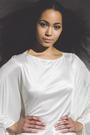 Madeleine Mantock isLaura